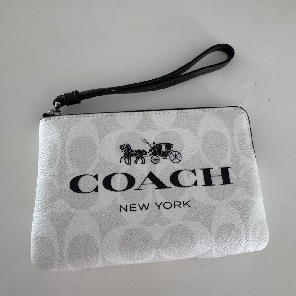 Coach Corner Zip Wristlet In Signature Canvas